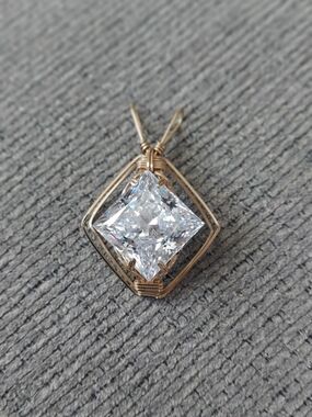 Gold-Tone Wireframe Necklace with Clear Cushion-Cut Gemstone
